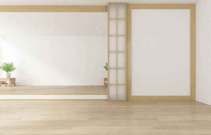 3D rendering of living room with small plant on wooden floor